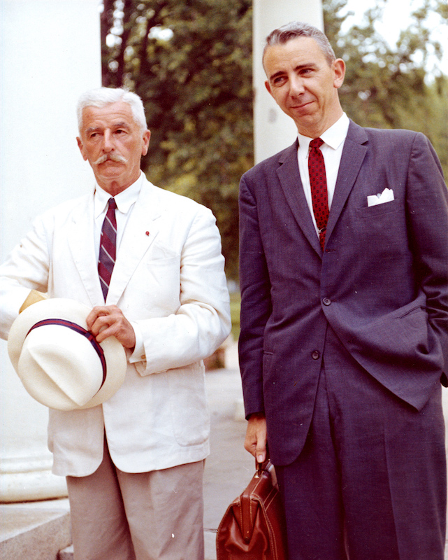 Faulkner posing by pillar